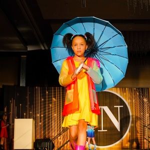 Super cute raincoat bought from Bambino Fashion. Worn once for a fashion show.